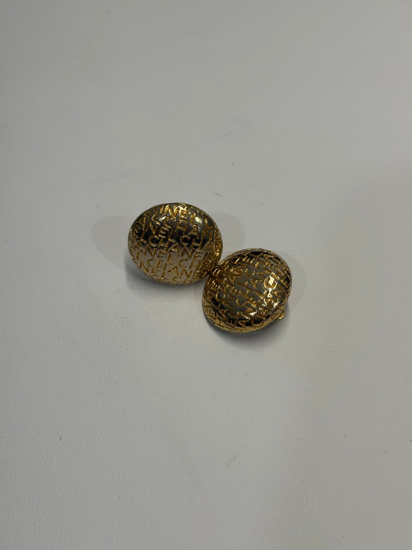 Chanel all over button stud